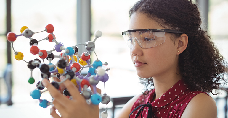 Girl holding STEM project